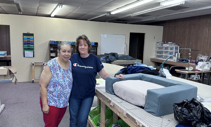 Mollie's Originals staff sewing Blue Toby Pet Beds